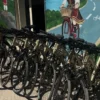 mural of the bike store of purealb and new bikes outside of the bike shop bike tirana