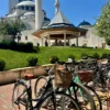 city bikes parked outside of mosque of namazgad in tirana
