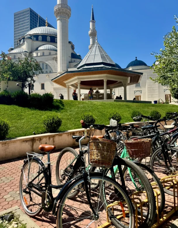 city bikes parked outside of mosque of namazgad in tirana